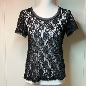 Black sheer lace/sequin top. Size S equivalent.